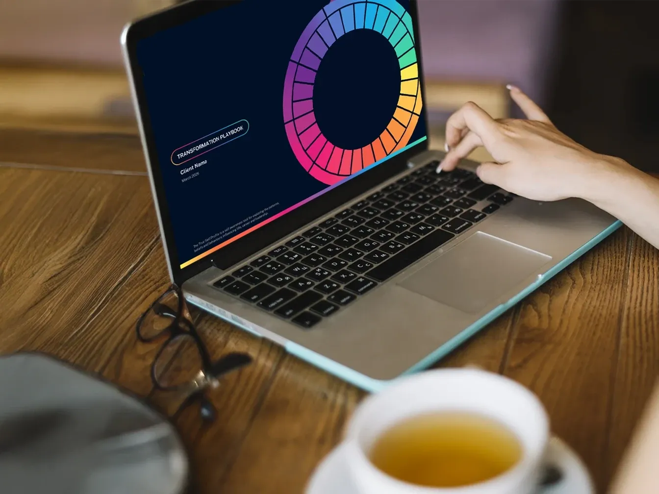 A Momentum profile open on a laptop, the wheel of pillars on the screen